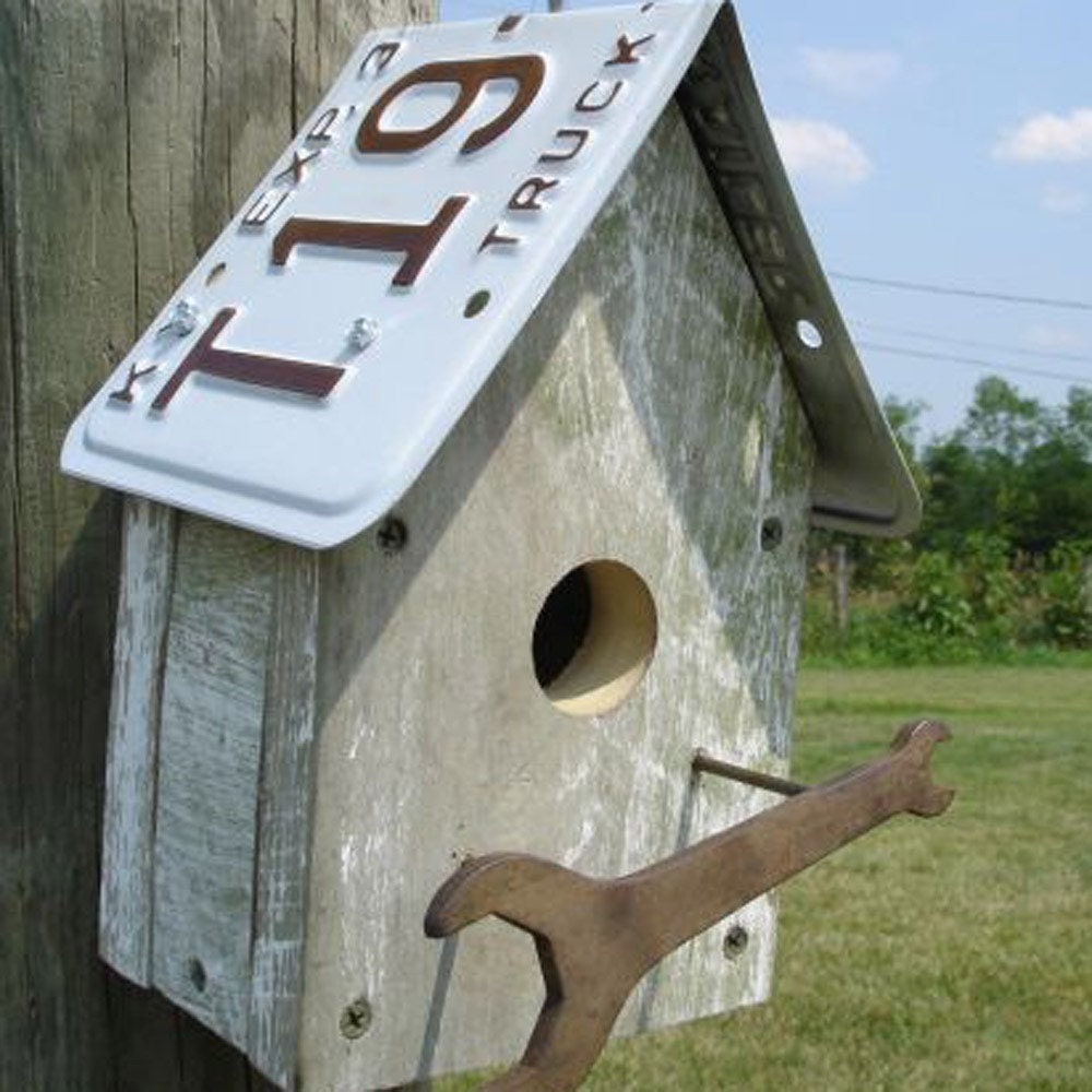 Kentucky plate birdhouse with vintage wrench perch