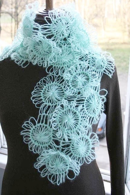 You can choose color and by order I can to knitt for you SCARF /SHAWL  with Flowers