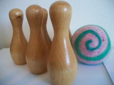 6 Wooden bowling pins and handfelted ball