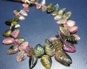 7inches,Bi Tourmaline Carved Leaf,1 full strand size is approx,13mm to 6mm,A Grade quality.