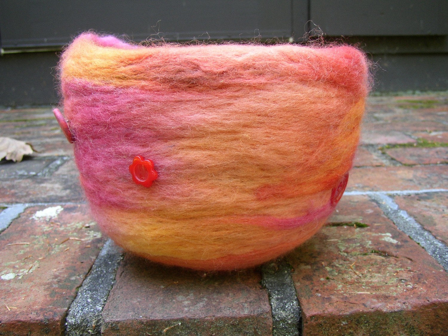 bright red, pink, orange, yellow button wool needle felted bowl