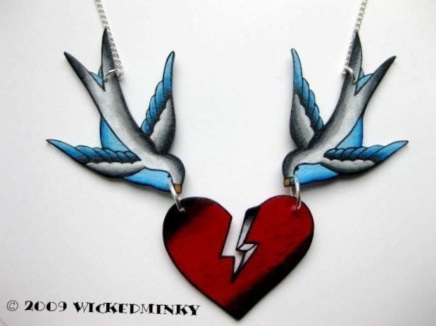 vintage tattoo style sparrows holding broken heart necklace