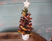 Pinecone Fruit and Spice Christmas tree, scented with orange spice oil.