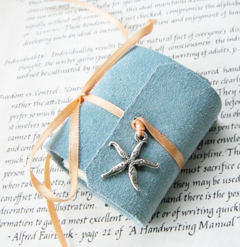 Pastel Blue Mini Book - with a silver starfish charm and peach ribbon tie.