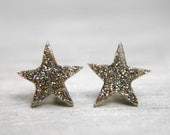 star post earrings in sparkly white gold