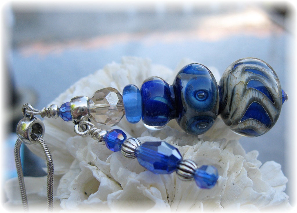Royal blue and silvered ivory, swarovski dangle and matching earrings