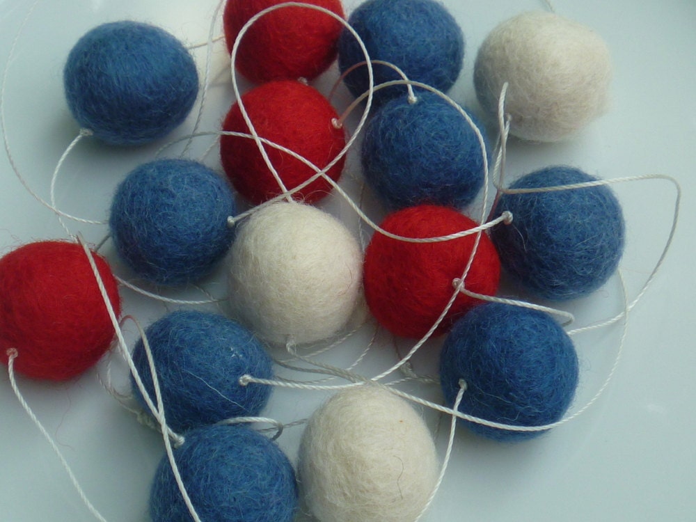 Blueberry Cherry Garland --  July 4th decoration -- a red, blue, and white mix on silver white cord  --  about 6 feet long, 15 felt balls