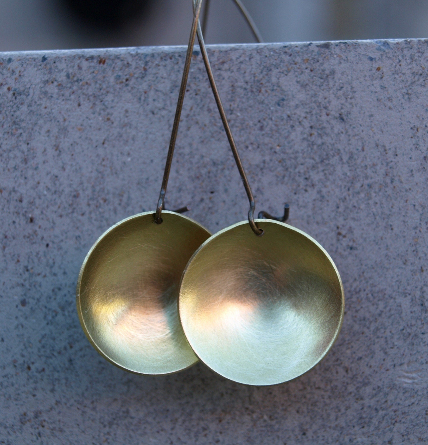 Domed brass discs