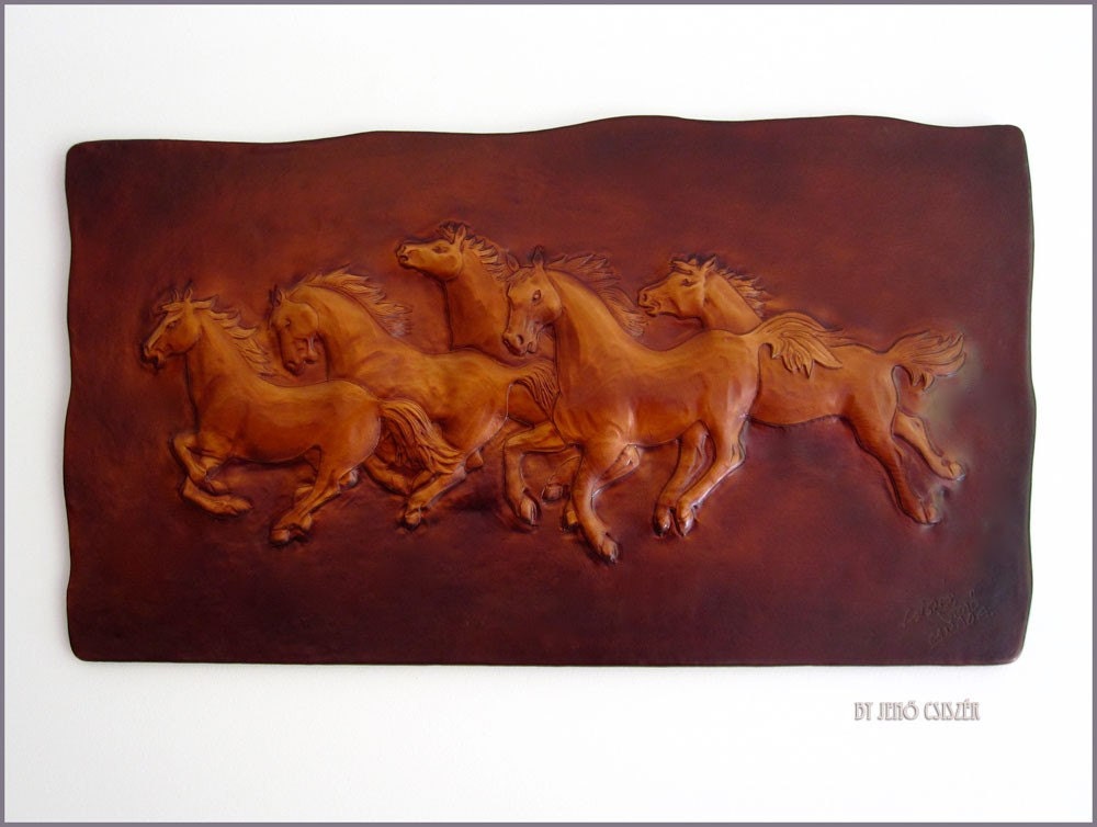 Five wild horses in leather