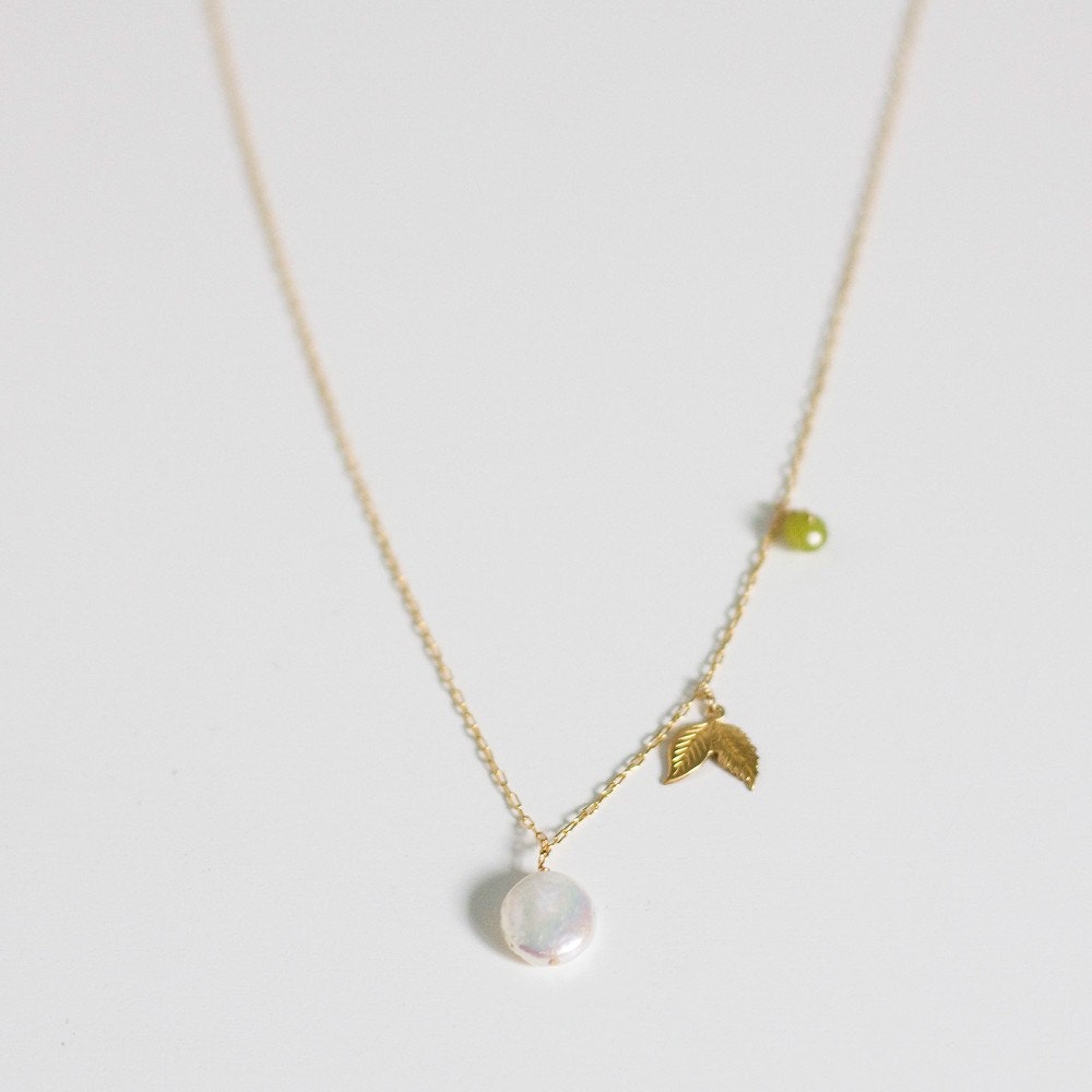 kendra necklace      . gold leaf charm     .