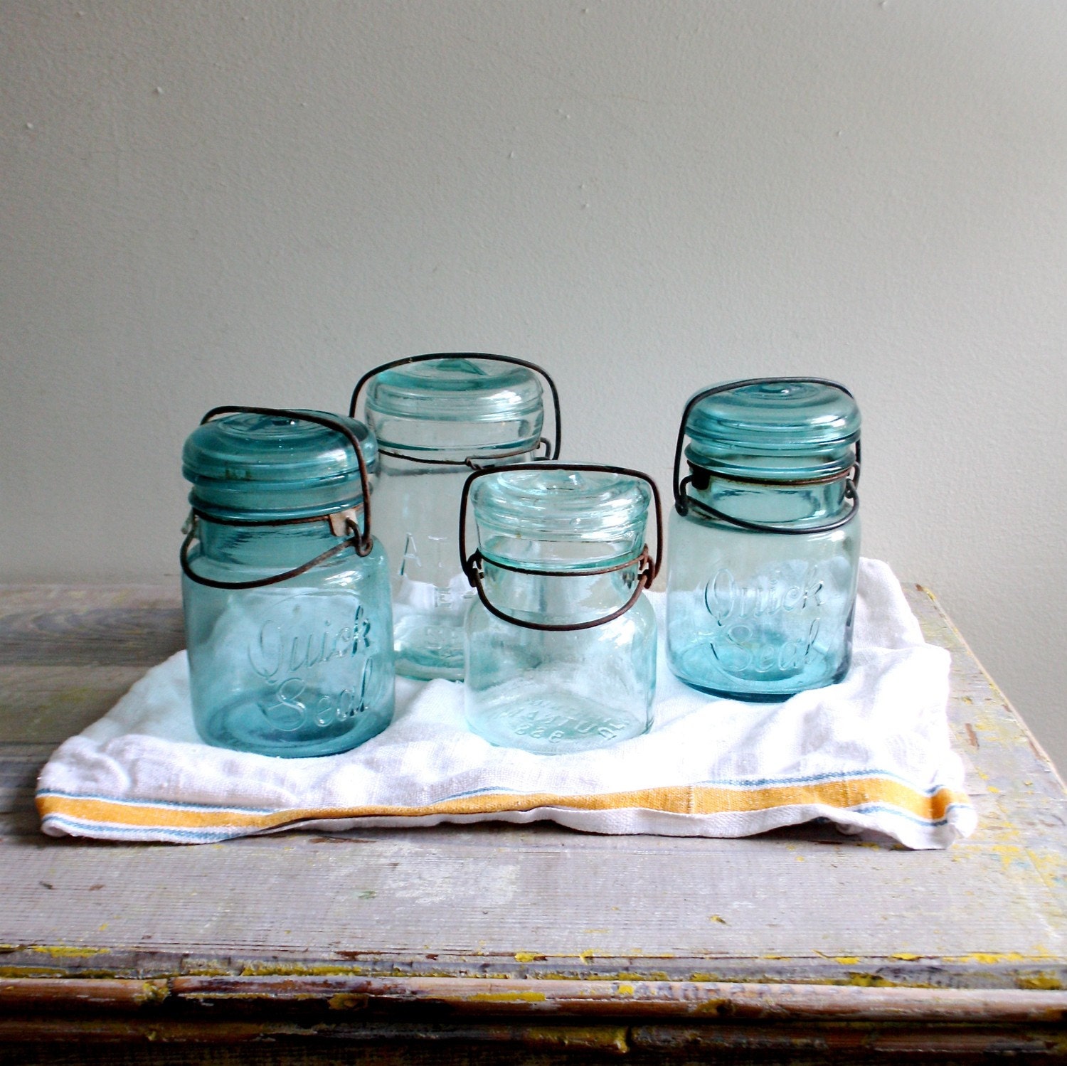 Collection of Blue Mason Jars in a Fruit Box