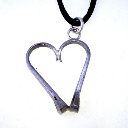 I love horseshoe nail jewelry! Rockout this necklace to show your love for