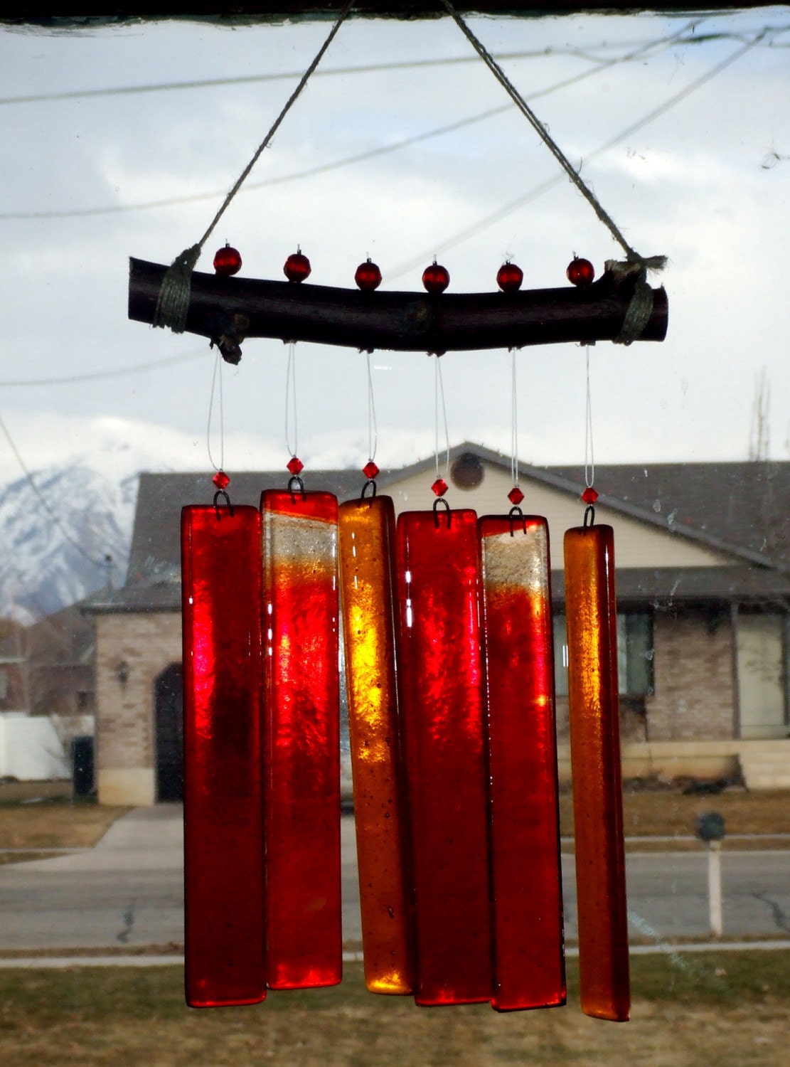 glass wind chimes. This wind-chime has a soft,