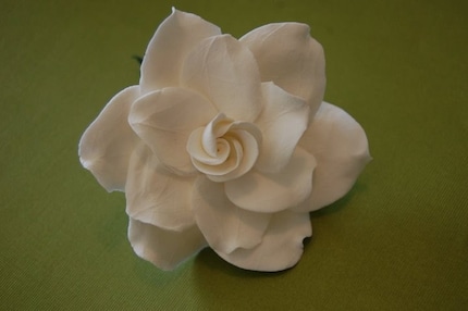 A clay gardenia hair flower