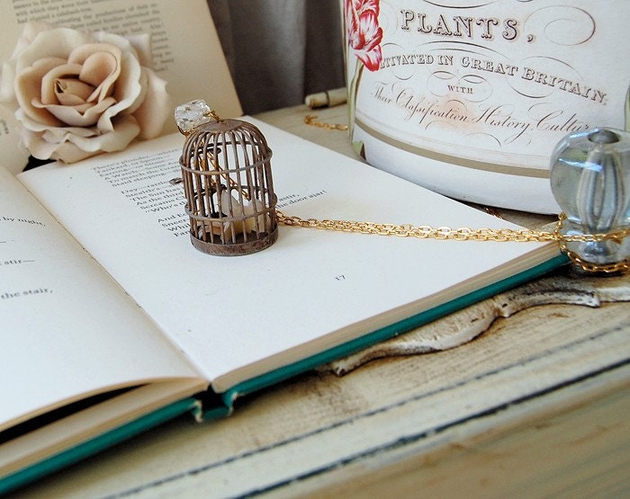 Very limited edition. Patina birdcage and little birdie.