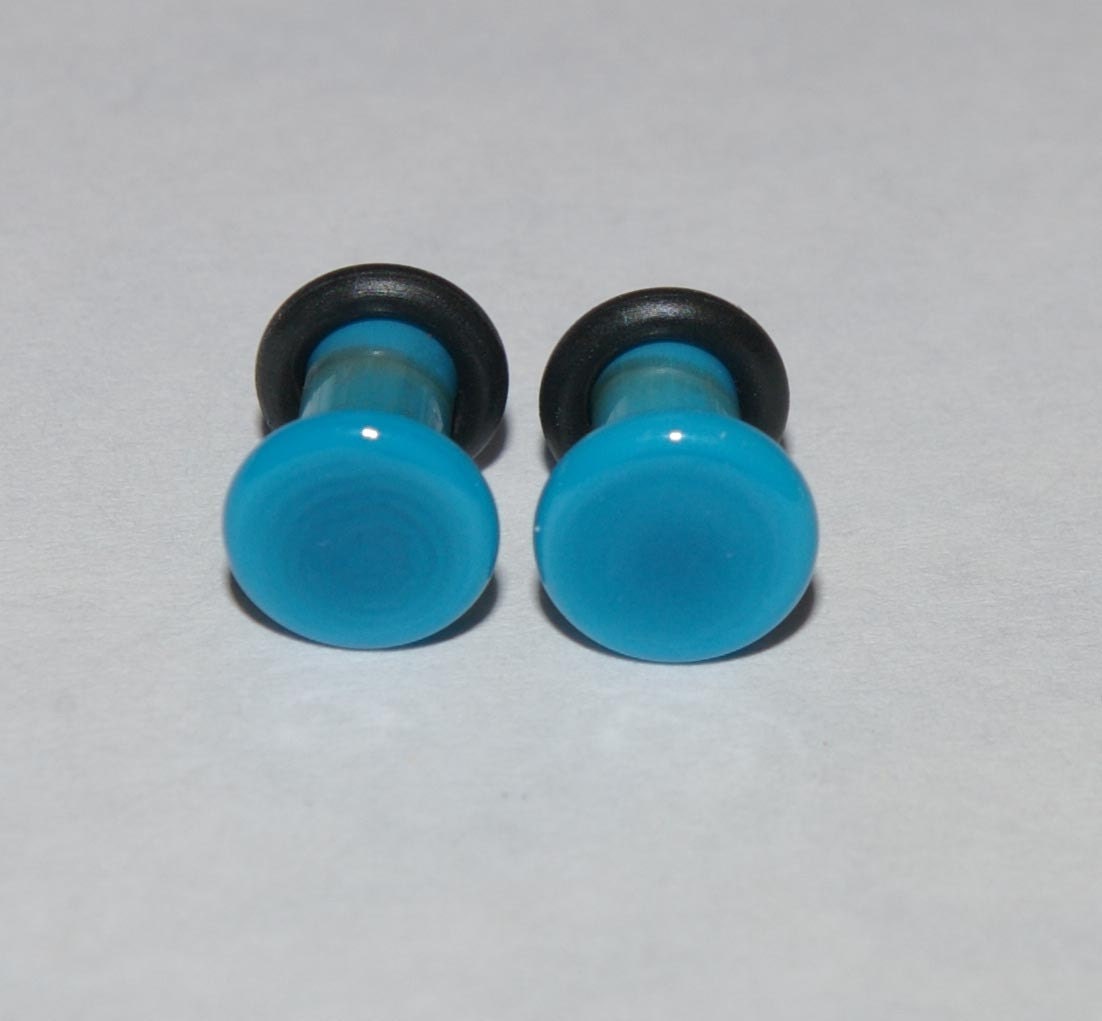 Flesh tunnels, flesh plugs and flesh tubes for your stretched ear piercings 