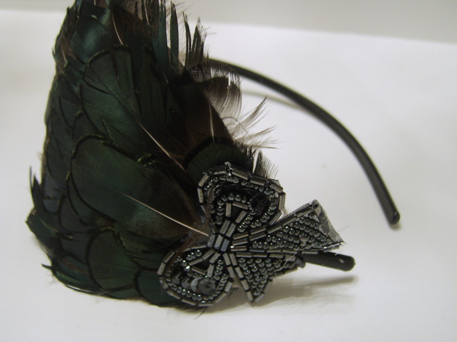 DIVA Metallic Green Feather Headband with Gunmetal Bow 