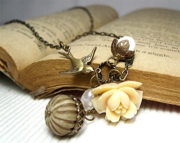 My Little Garden 4. Vintage ivory cream nature necklace with swallow, acorn, leaves, antiqued brass, flower, nut charms