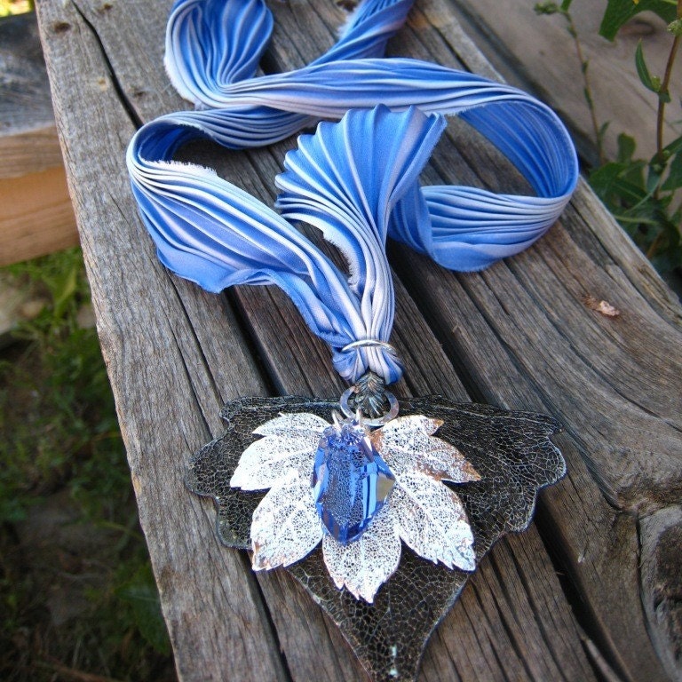 Blue Autumn Sky -- hand dyed and pleated blue and cream silk ribbon with preserved sterling silver leaves and tanzanite swarovski