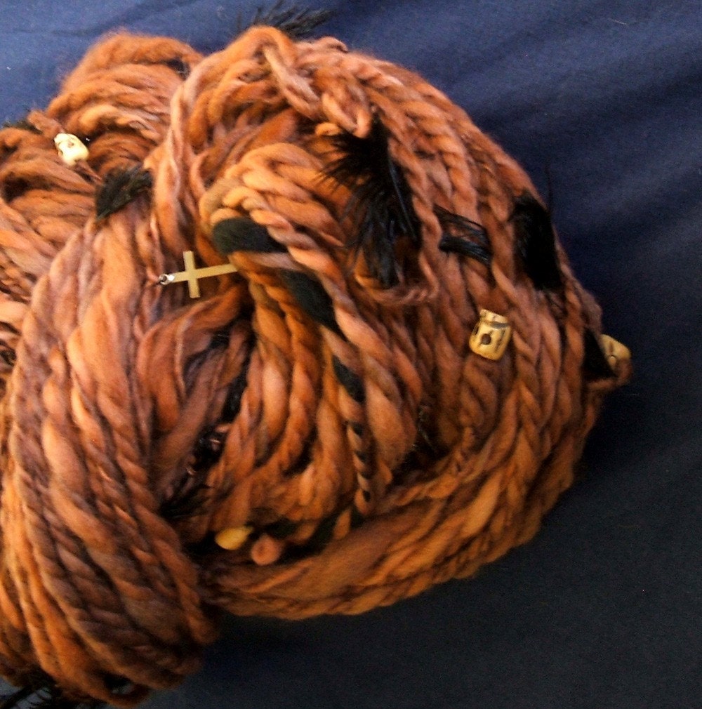 Skull Island - Handspun and handdyed Art Yarn with Black Feathers and Bone Skulls