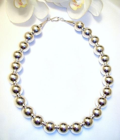 large silver beads. The large Sterling Silver