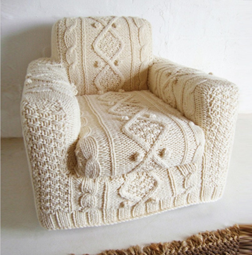 hand knitted cream aran armchair slip cover