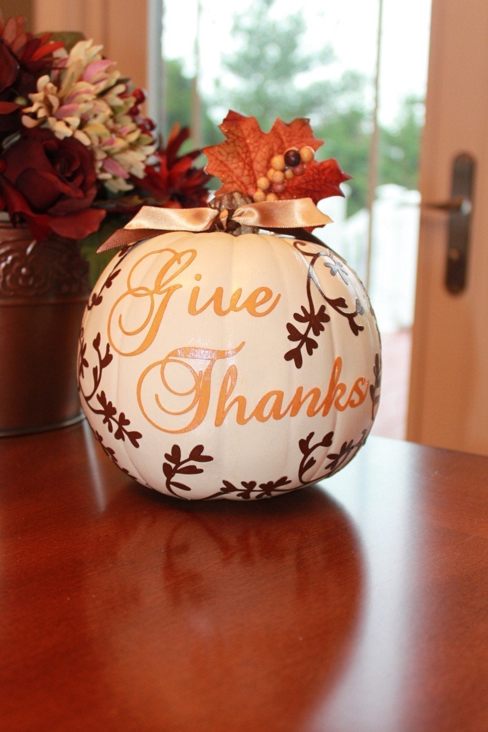 Give Thanks With This Cream and Chocolate Brown Pumpkin Centerpiece