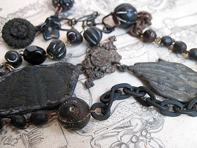 Lover of the Demented. Fossil and Assembled Blacks Necklace.