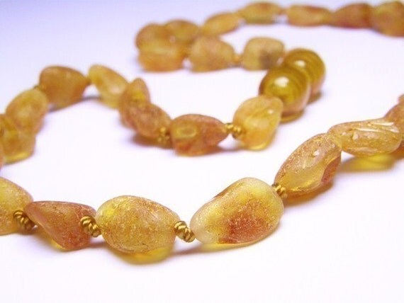 Maximum effective Raw sea amber oval form teething necklace for your baby.