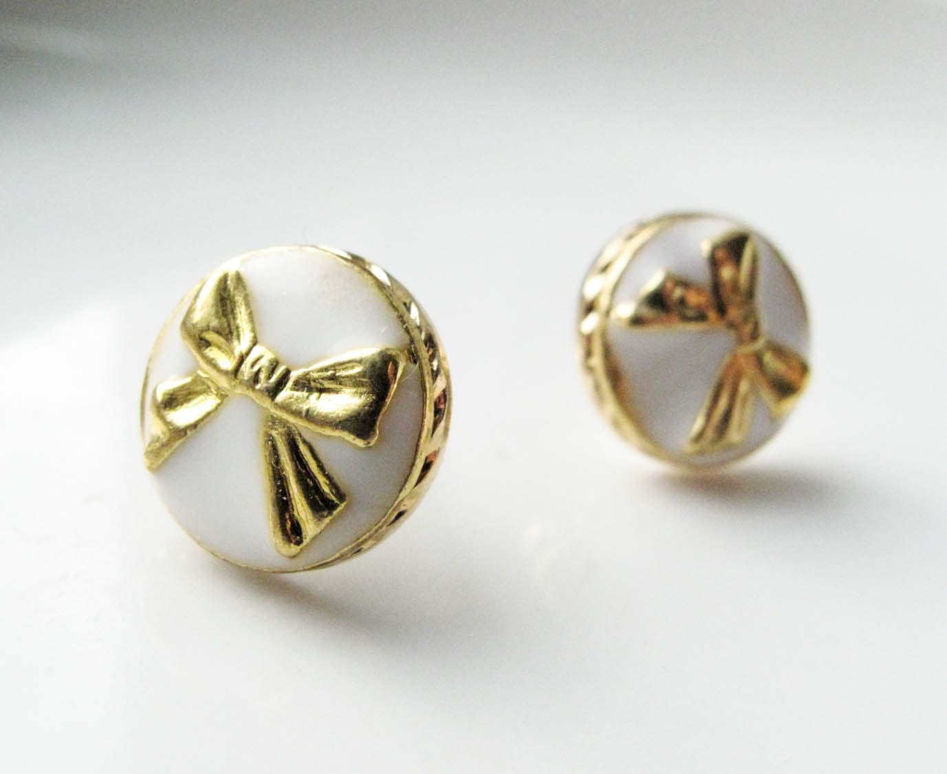 Gold Bow Post Earrings in Enameled Metal