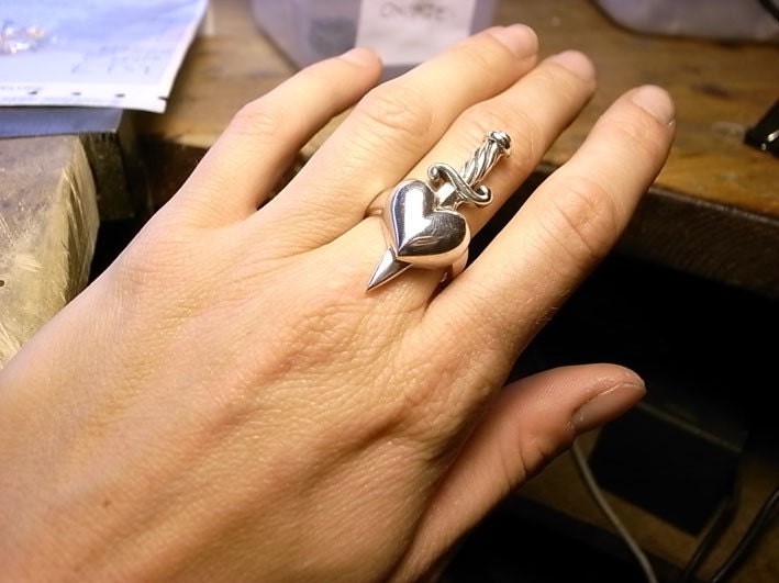 Sterling silver heart ring with dagger