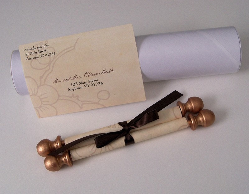 Scroll invitation with cherry blossom and mailing tubes
