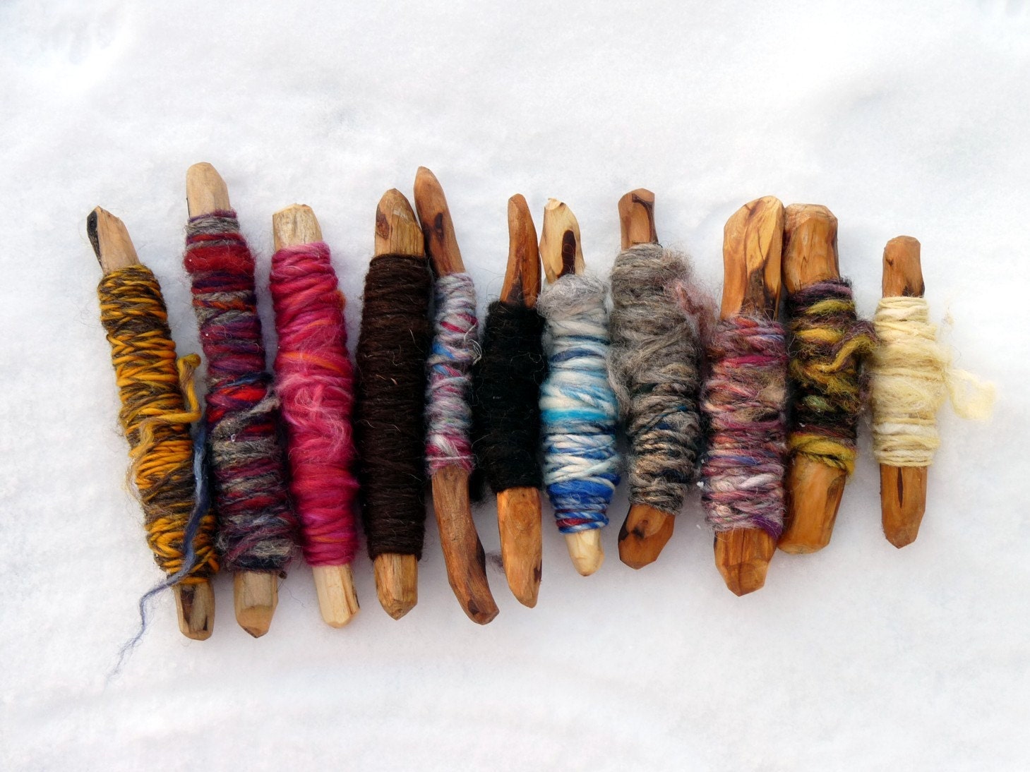 Wooden sticks for storing little balls of yarns