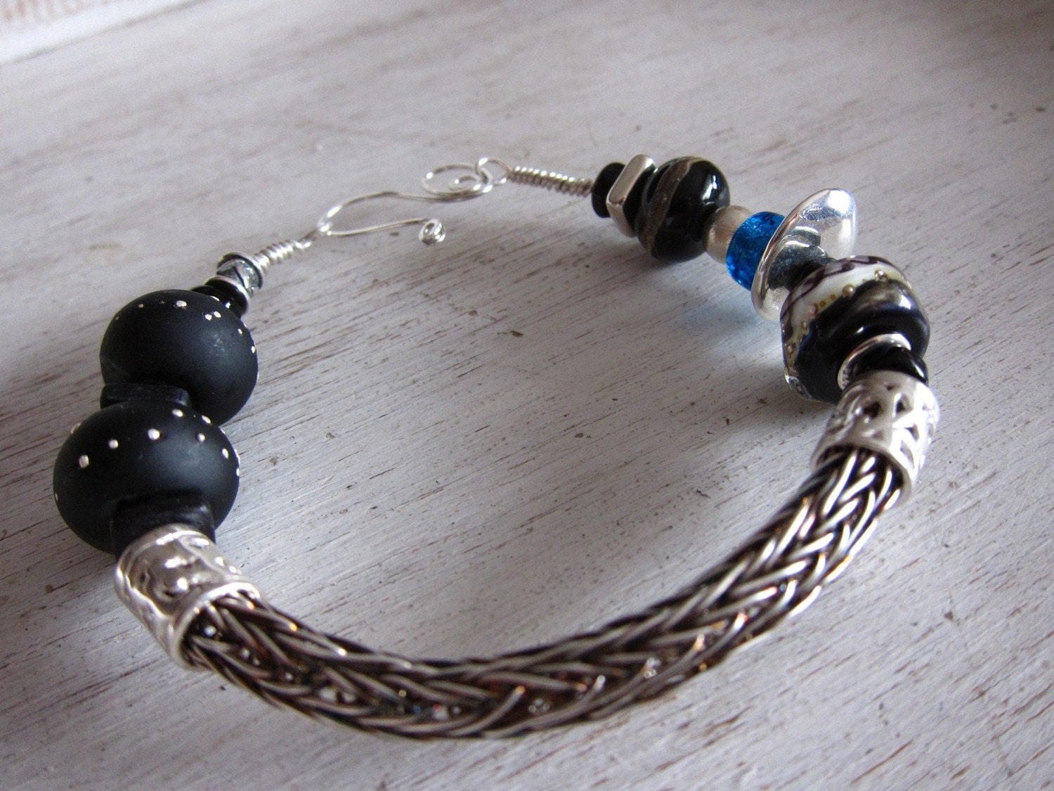 Into the Night, Sterling silver viking knit bracelet with black lampwork beads