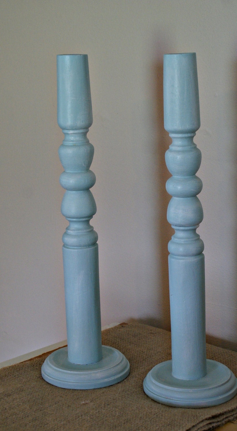 Pair of aqua candle sticks