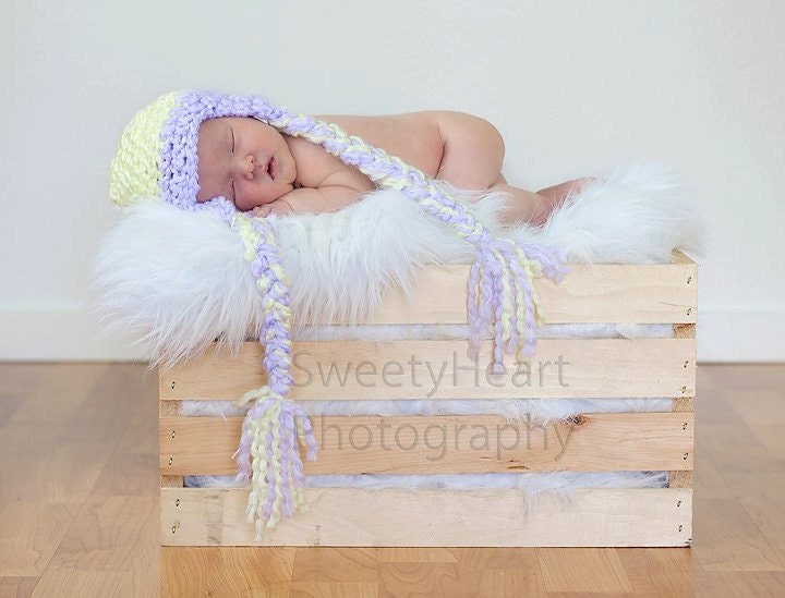 Newborn crochet earflap with tails hat in yellow and purple