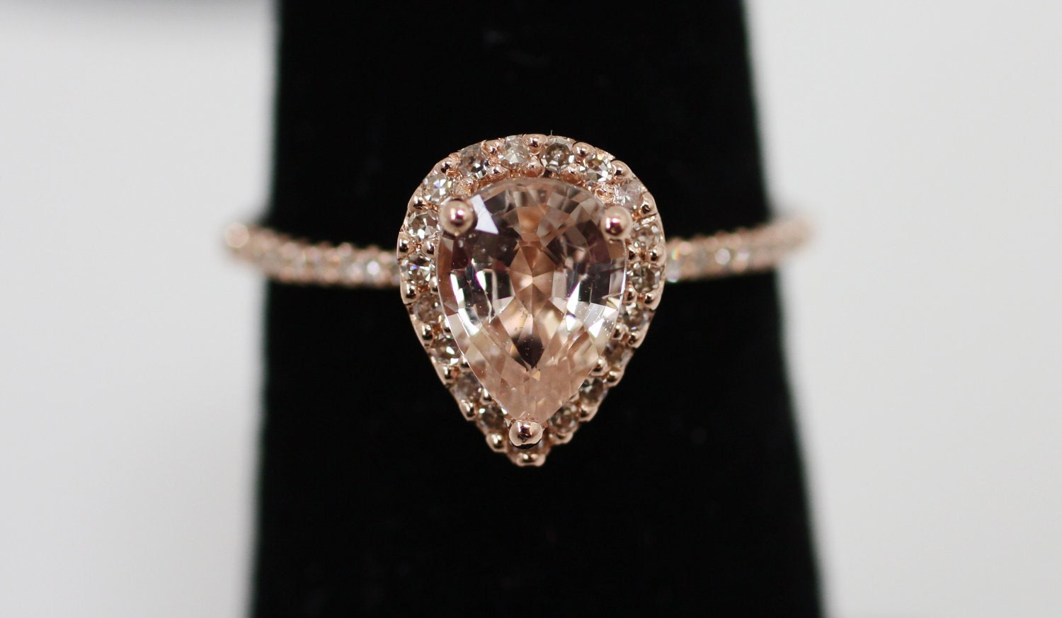 Peach champagne tear drop sapphire and rose gold diamond ring