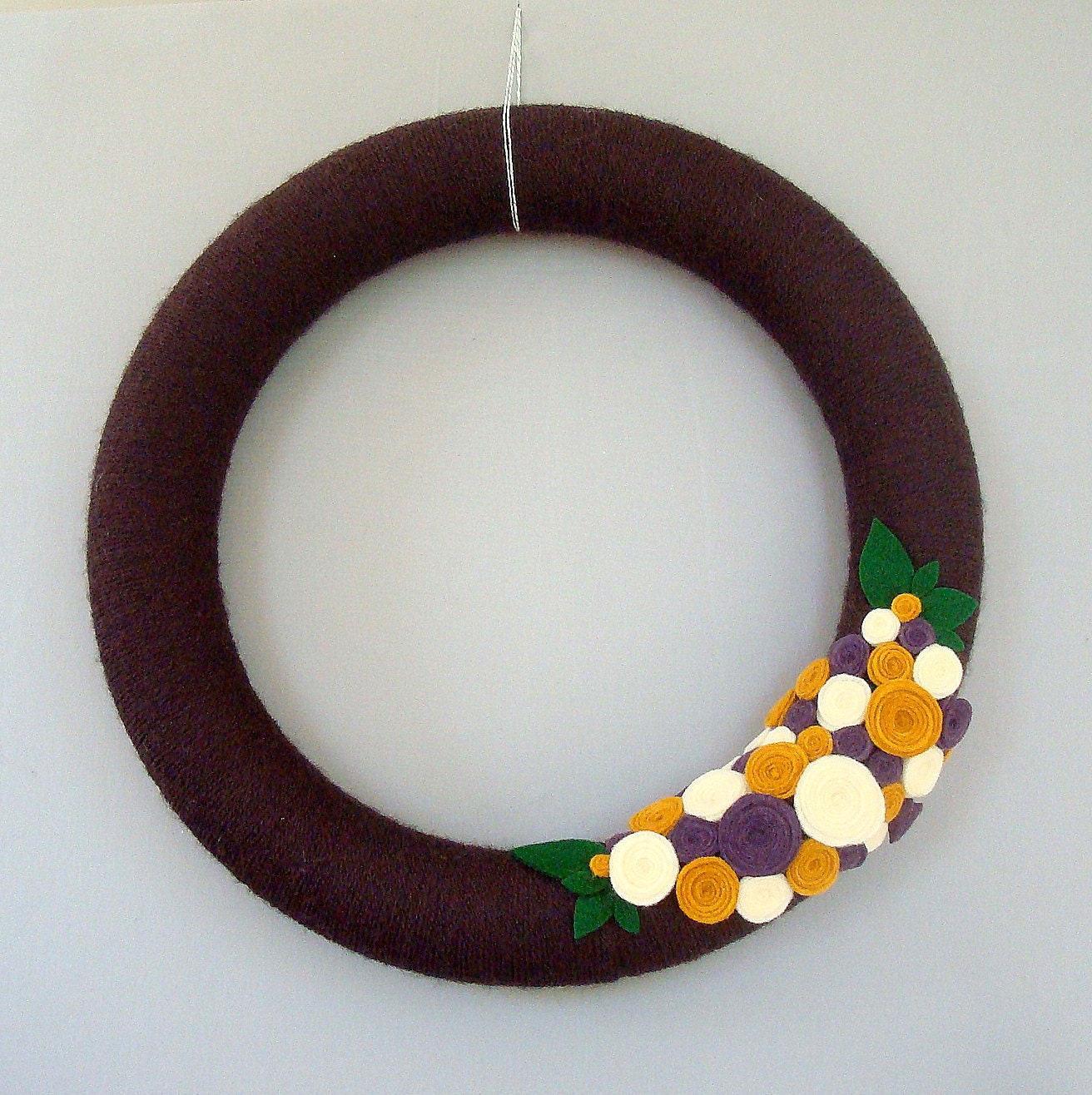 Chocolate brown yarn wreath.  14 "Door Wreath with brown, mustard, purple and cream flowers felt. Fall home decor at Heartfelt Wreaths yarn.
