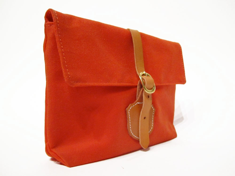 The Clutch in Orange waxed cotton