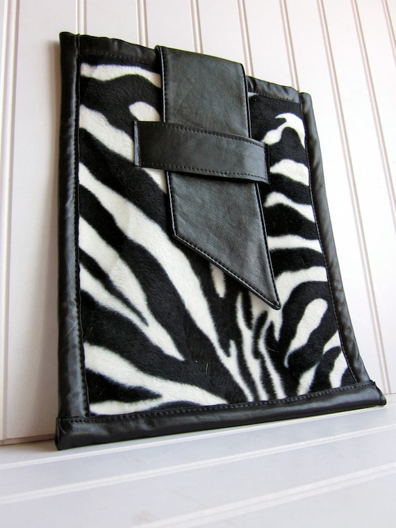 Zebra iPad Sleeve, faux fur trimmed with leather. Black and white iPad case, with slide closure.