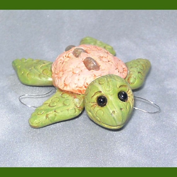 Rosie the sea turtle, a sculptured pendant