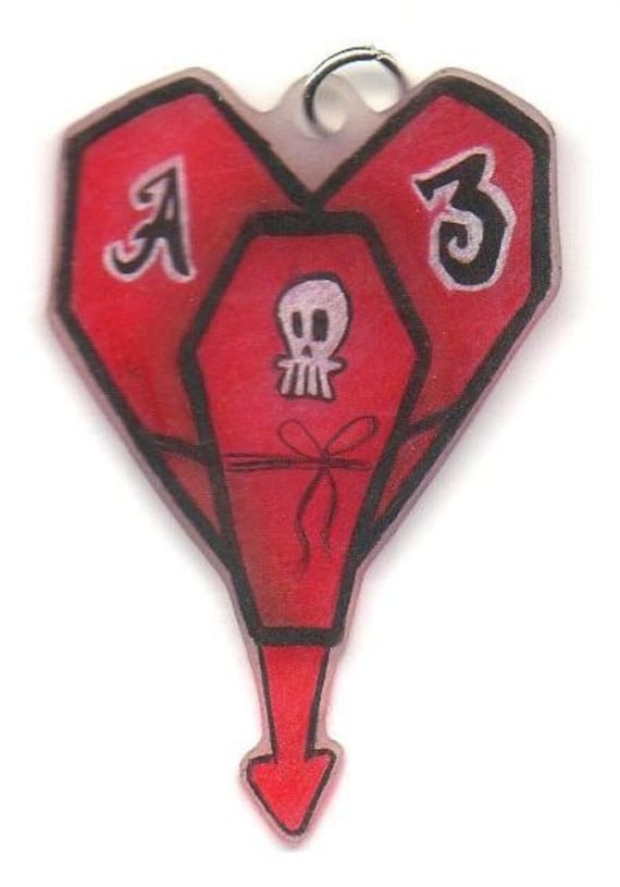 this is the alkaline trio logo drawn in an interesting way with coffins that 