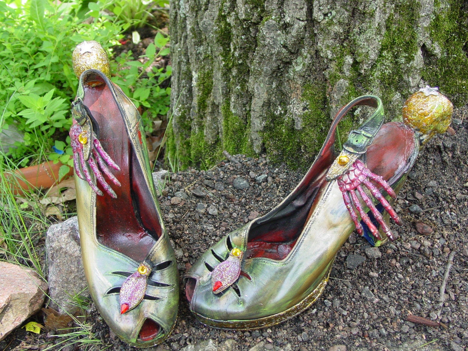 The wonderful WORLD OF OZ shoes series. The wicked witch of the west. recycled shoes by artist Catherine Reinke