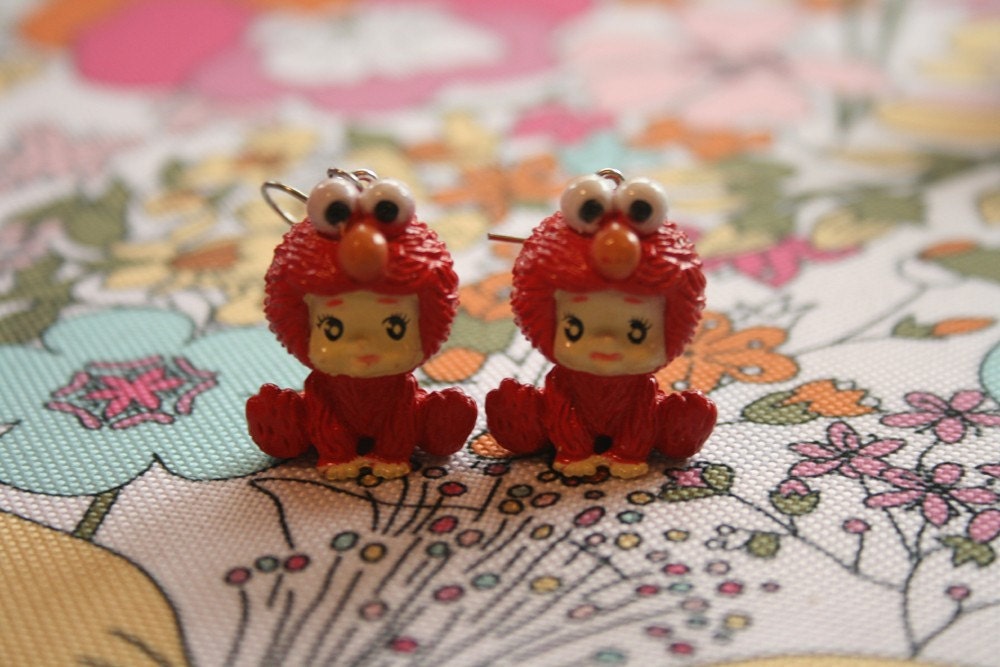 Kewpie in Elmo costume earrings