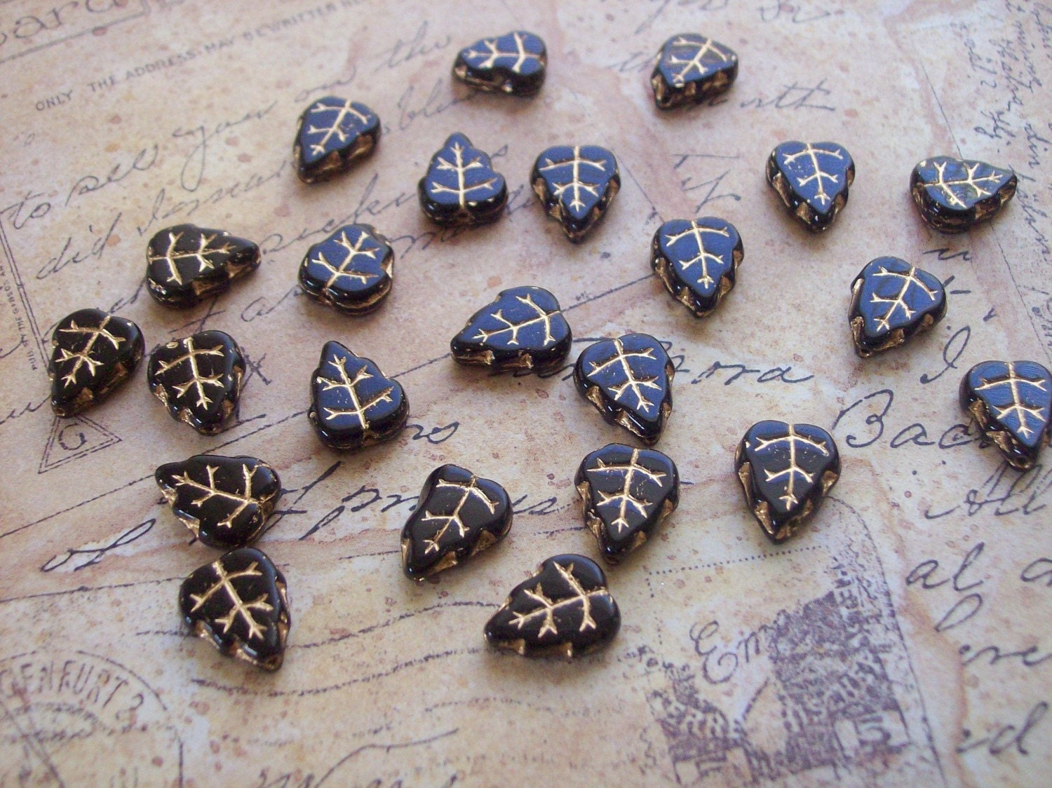 100 Czech black leaves gold inlay