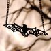 Filigree Victorian Bat necklace in black stainless steel - ornate flourish