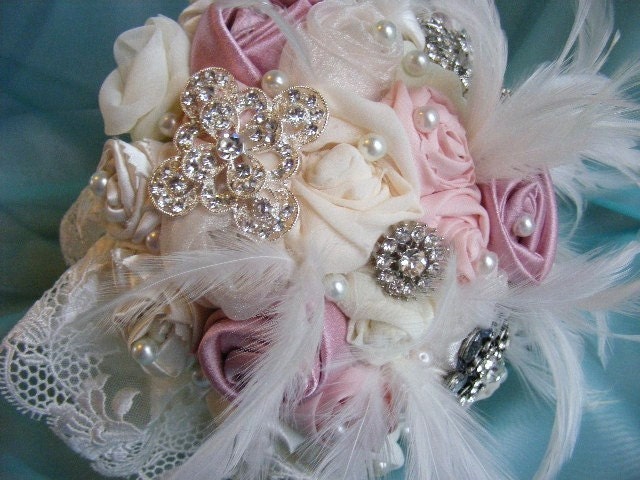 unique bridal bouquet of ivory and dusty pink roses vintage feathers