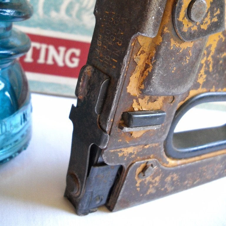 staple gun. stapler. tools. vintage
