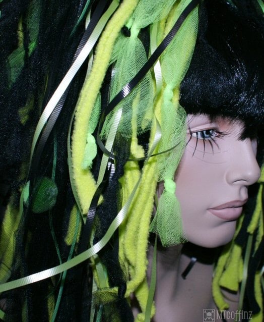 black and neon green hair.
