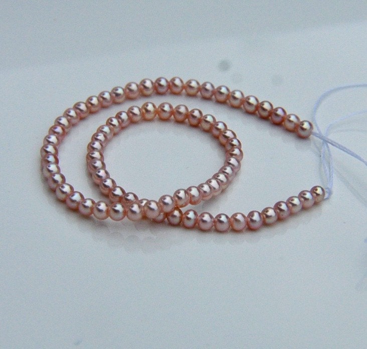  seed pearls 2.5mm Quantity: 1/2 